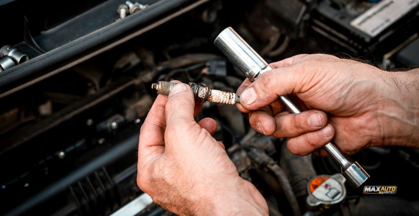 how to close spark plug gap