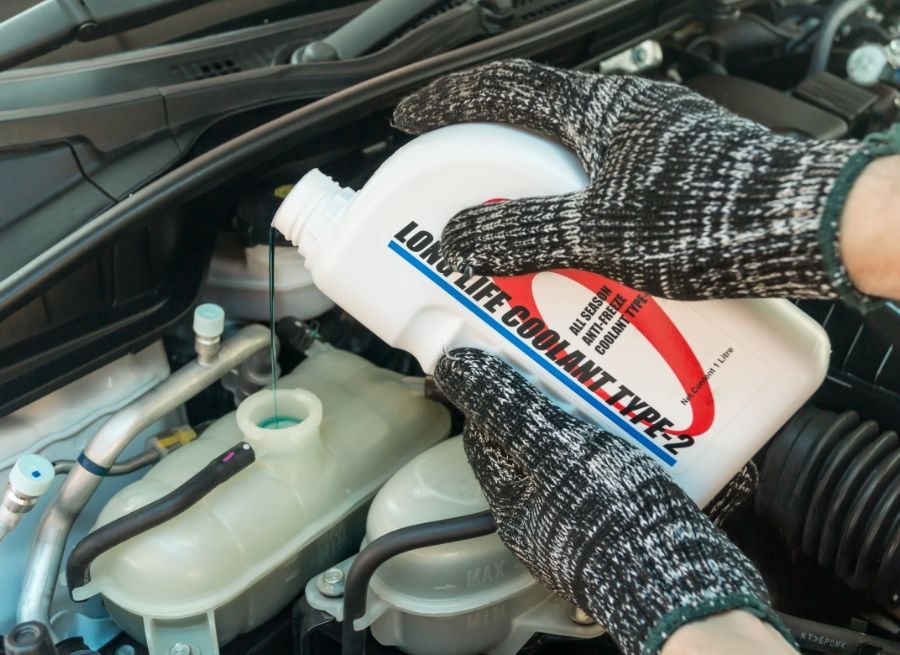 can you add coolant to a hot engine