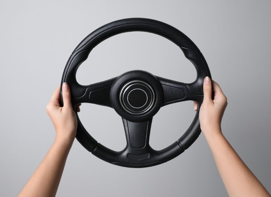how to take a steering wheel cover off